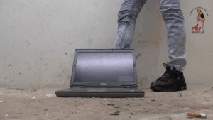 Working Laptop Under Sneakers Floor View